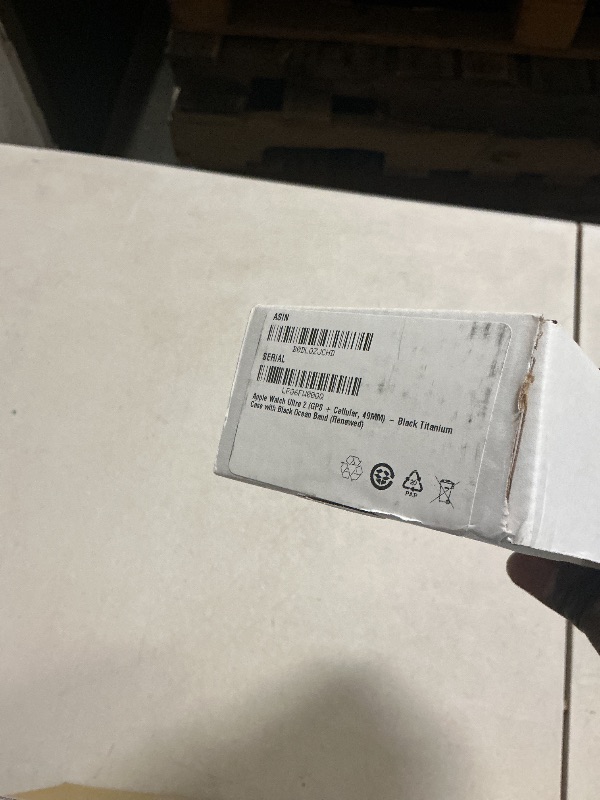 Photo 1 of Apple Watch Ultra 2 (GPS + Cellular, 49MM) - Black Titanium Case with Black Ocean Band (Renewed)