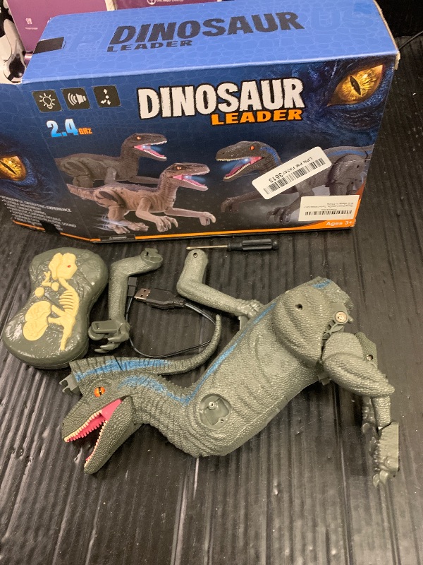 Photo 1 of J Rootage Remote Control Dinosaur, Realistic Dinosaur Toys for Kids 3-5, 2.4GHZ, Walking,Rechargeable, 3D Eyes, 3 Sound Effects, Demo Function, Jurassic Toys for Christmas, Kids 3+