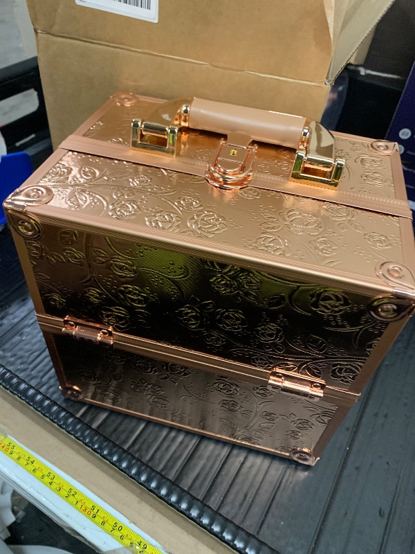 Photo 1 of FRENESSA Makeup Train Case Cosmetic Box Portable Makeup Case Organizer 4 Trays Lock Travel Storage Organizer with Dividers Make Up Artist Vanity Hard Nail Spa Beauty Box Rose Gold Floral