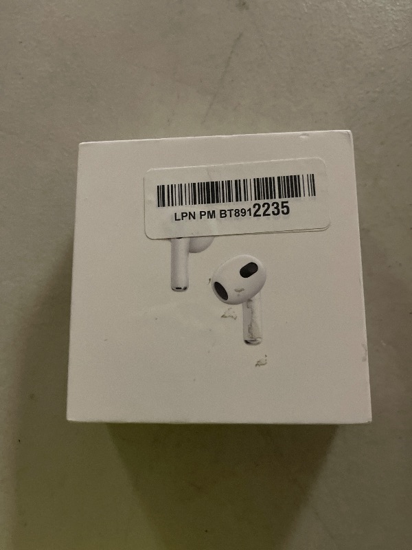 Photo 1 of Apple AirPods (3rd Generation) Wireless Ear Buds, Bluetooth Headphones, Personalized Spatial Audio, Sweat and Water Resistant, Lightning Charging Case Included, Up to 30 Hours of Battery Life