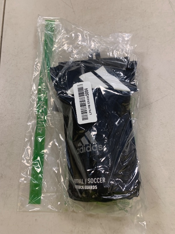 Photo 1 of adidas Unisex-Child Performance Youth Sock Shin Guards, Black/White, Small