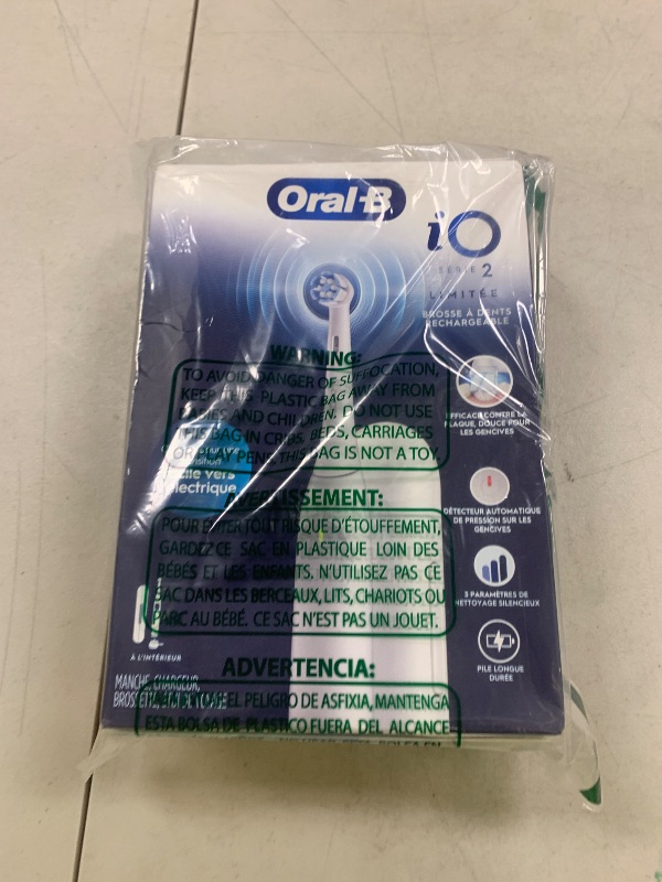 Photo 1 of Oral-B iO Simple Clean Rechargeable Electric Powered Toothbrush, Pure White with 1 Gentle Care Brush Head and 1 White Travel Case - Automatic Pressure Sensor to Protect Gums - 3 Modes -2 Min Timer
