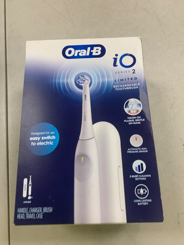 Photo 1 of Oral-B iO Simple Clean Rechargeable Electric Powered Toothbrush, Pure White with 1 Gentle Care Brush Head and 1 White Travel Case - Automatic Pressure Sensor to Protect Gums - 3 Modes -2 Min Timer