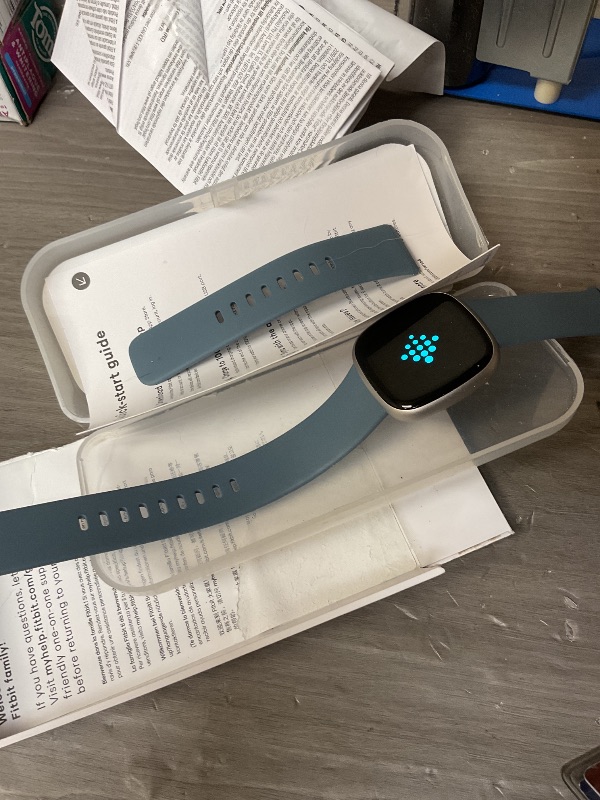 Photo 1 of Fitbit Versa 4 Fitness Smartwatch with Daily Readiness, GPS, 24/7 Heart Rate, 40+ Exercise Modes, Sleep Tracking and more, Waterfall Blue/Platinum, One Size (S & L Bands Included)