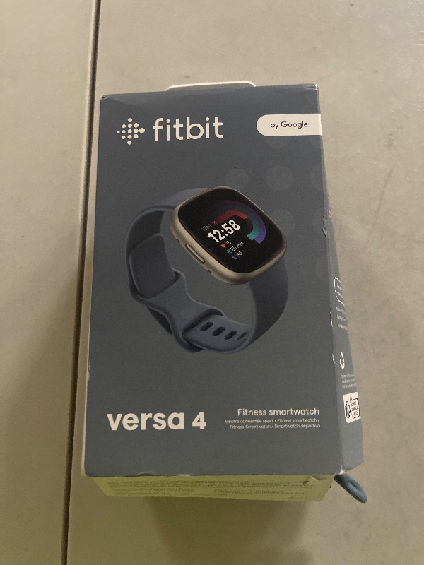 Photo 1 of Fitbit Versa 4 Fitness Smartwatch with Daily Readiness, GPS, 24/7 Heart Rate, 40+ Exercise Modes, Sleep Tracking and more, Waterfall Blue/Platinum, One Size (S & L Bands Included)