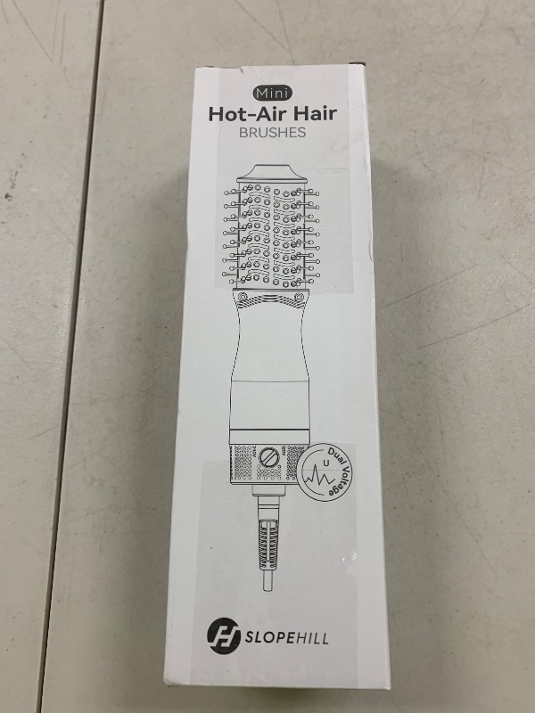 Photo 1 of slopehill Mini Dual Voltage Hair Dryer Brush,1000 Watts Travel Hot Air Brush with European Plug, Ionic One Step Hair Dryer and Styler for Women for Home & Salon, Oval Barrel 2 Heat & 2 Speed Settings