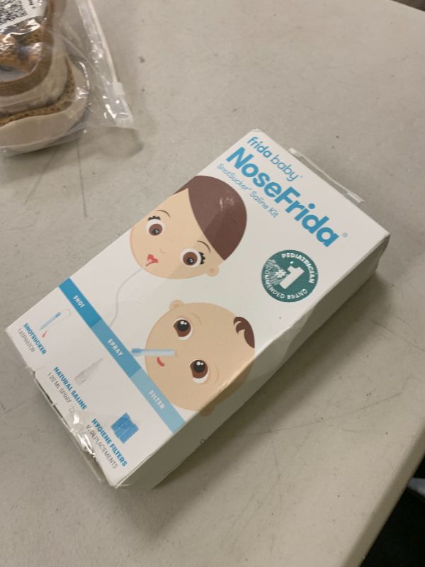 Photo 1 of Frida Baby Saline Kit, Includes NoseFrida Nasal Aspirator for Baby, Baby Nose Sucker, Saline Nasal Spray for Babies with 10 Extra Hygiene Filters, Nasal Spray Decongestant, 0.68 fl oz