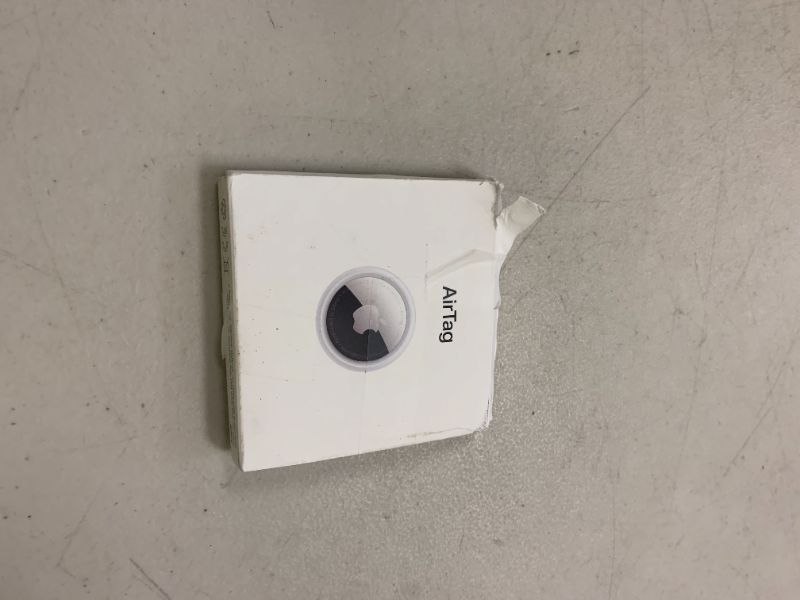 Photo 1 of Apple AirTag. Keep Track of and find Your Keys, Wallet, Luggage, Backpack, and More. Simple one-tap Set up with iPhone or iPad