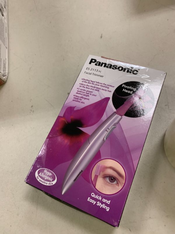 Photo 1 of Panasonic Women’s Facial Hair Remover and Eyebrow Trimmer with Pivoting Head, Includes 2 Gentle Blades for Brow and Face and 2 Eyebrow Trim Attachments, Battery-Operated – ES2113PC