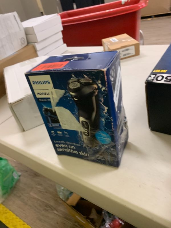 Photo 1 of Philips Norelco Shaver 3900 Series, Wet and Dry Electric Shaver, P-Cap, Travel Pouch, Charging Stand, Storm Blue, Model S3341/92