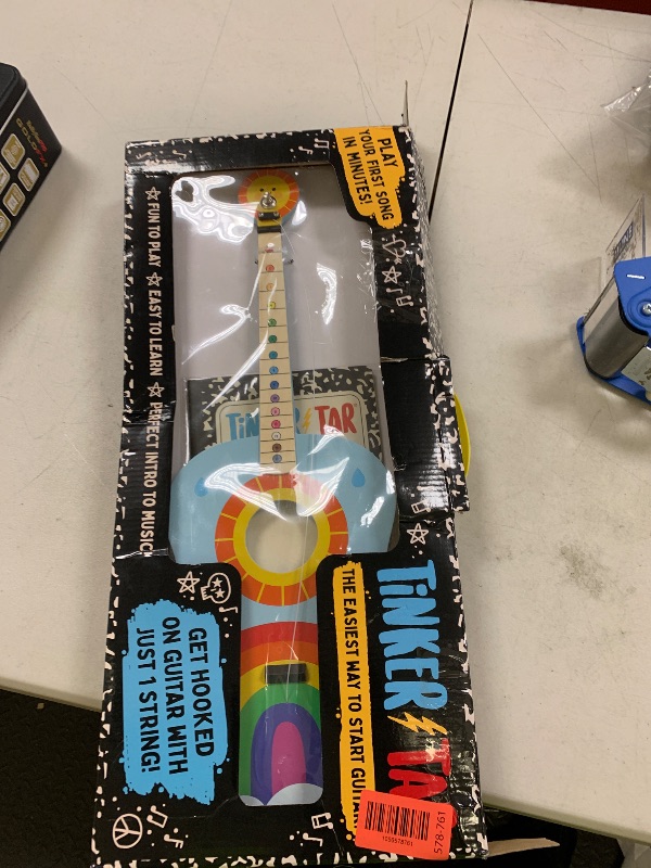 Photo 1 of TinkerTar - Rainbow Acoustic Guitar - The Easiest Way to Start and Learn Guitar - 1 Stringed Toy Instrument for Kids Perfect Intro to Music for Young Kids Ages 3 and up - from Buffalo Games