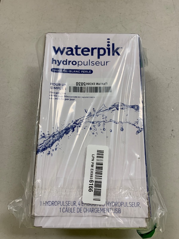 Photo 1 of Waterpik Cordless Pearl Rechargeable Portable Water Flosser for Teeth, Gums, Braces Care and Travel with 4 Flossing Tips - ADA Accepted, WF-13 White, Packaging May Vary