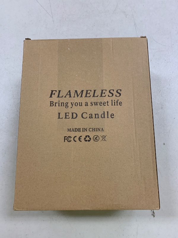 Photo 1 of kakoya 10" x 4" Large Outdoor Waterproof Flickering Flameless Candles with Timer,2Pcs Battery Operated LED Pillar Candles with Embedded Star String for Outdoor Lanterns,Porch,Patio Decor(Ivory)