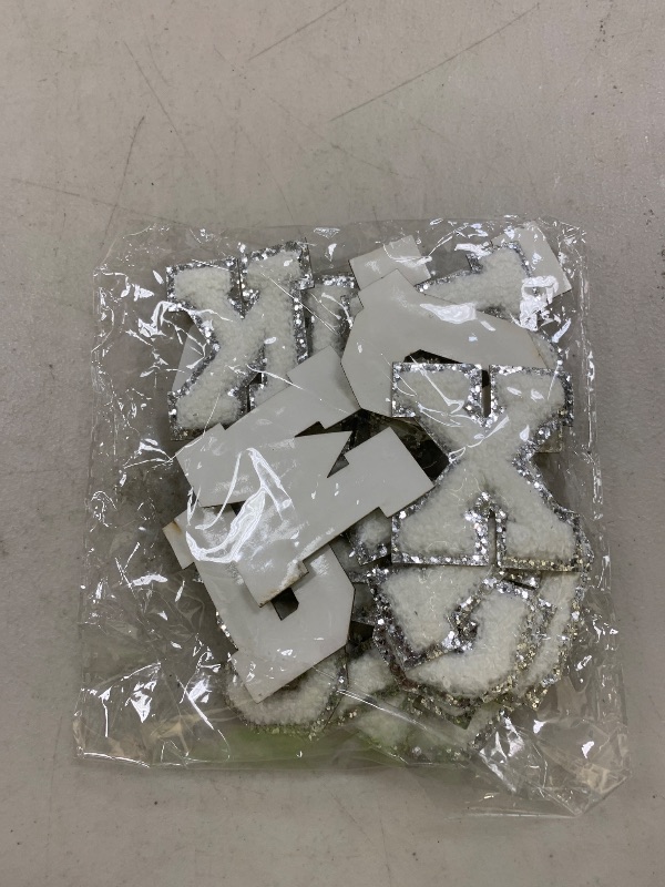 Photo 1 of Jutom 72 Pcs Chenille Letter Patches Iron on Letter Number Patches Self Adhesive Chenille Embroidered Decals for Clothing (White with Silver Edge)