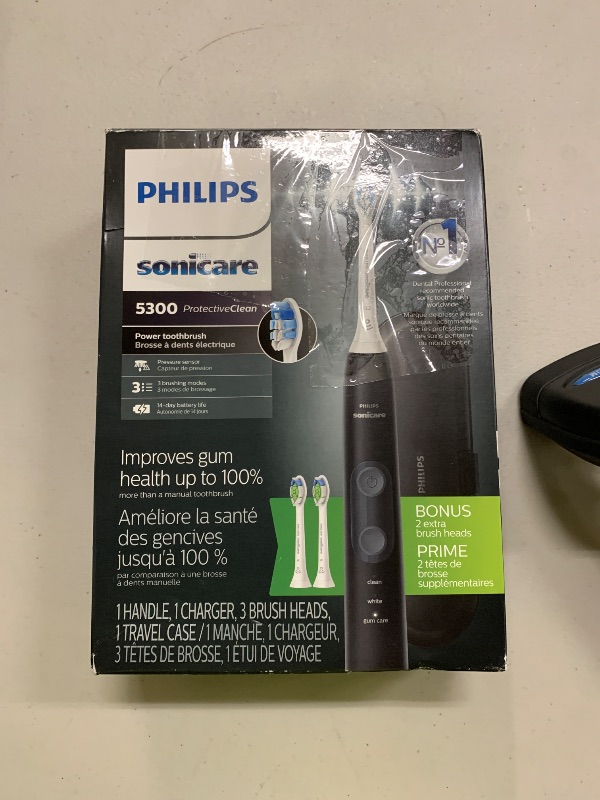 Photo 1 of Philips Sonicare ProtectiveClean 5300 Rechargeable Electric Toothbrush, with Pressure Sensor, 3 Cleaning Modes, SmarTimer and QuadPacer, with 2 Bonus Brush Heads, Travel Case, Black, Model HX6423/34