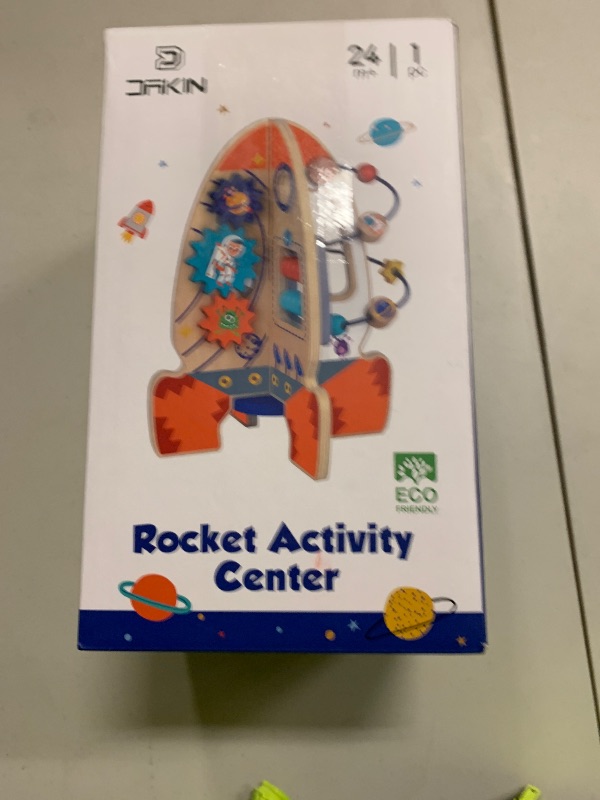 Photo 1 of D DAKIN Rocket Toddler Wooden Activity Center Activity Cube Stand for 1 Year Old Boy Toys, Sensory and Educational Great First Birthday Gifts for Boys