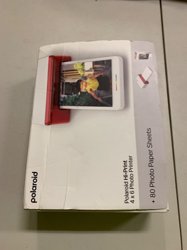 Photo 1 of Polaroid Hi-Print Bluetooth 4x6 Photo Printer + Photo Paper Bundle (80 Sheets Included) (6552)