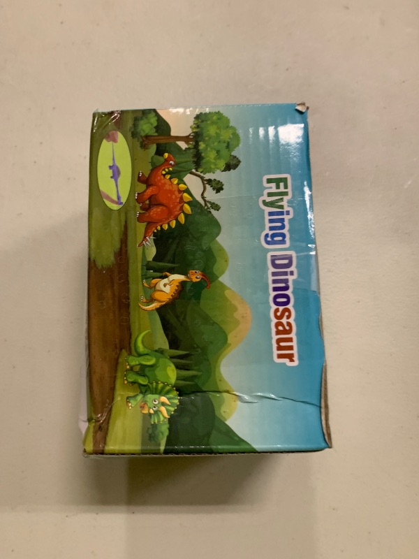 Photo 1 of 38 Pcs Slingshot Dinosaur Finger Toys, Halloween Toys Party Favors for Kids Sticky Rubber Dino Flying Catapult Fidget Toys for Boys Girls Goodie Bag Easter Basket Stuffers Valentines Xmas Gifts