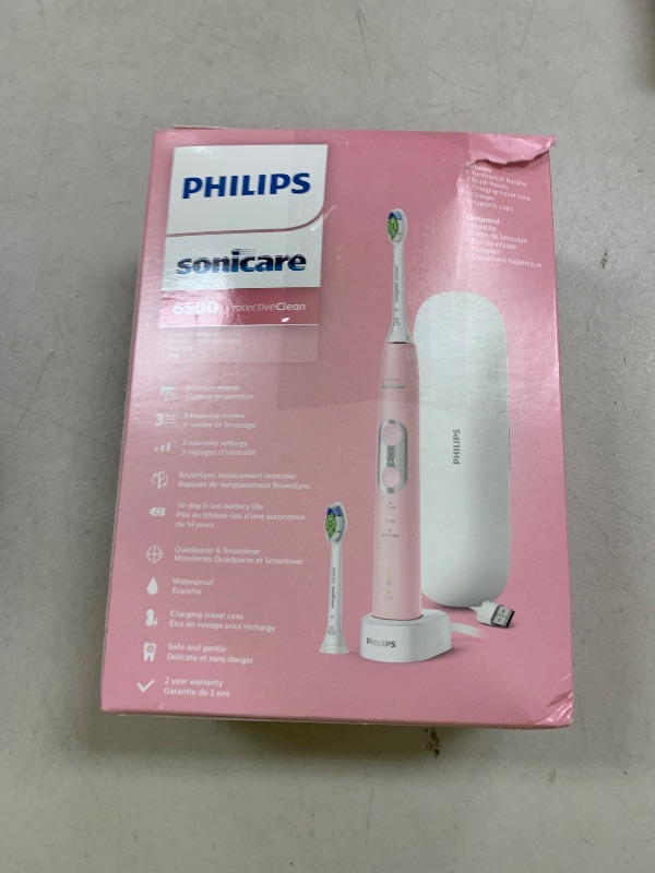 Photo 1 of Philips Sonicare ProtectiveClean 6500 Rechargeable Electric Toothbrush, with Pressure Sensor, 3 Cleaning Modes, SmarTimer and QuadPacer, 14-Day Battery Life, Charging Travel Case, Pink, HX6462/06
