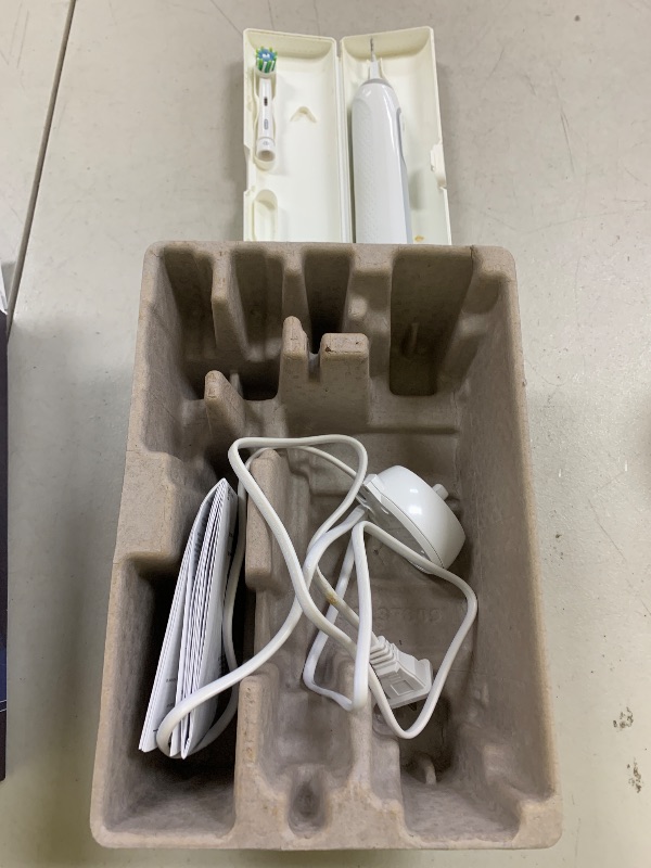 Photo 1 of Oral-B Genius X Limited Rechargeable Electric Toothbrush with 1 Replacement Brush Head, Travel Case, White