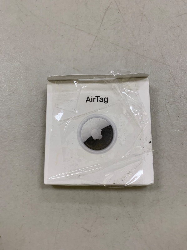 Photo 1 of Apple AirTag. Keep Track of and find Your Keys, Wallet, Luggage, Backpack, and More. Simple one-tap Set up with iPhone or iPad