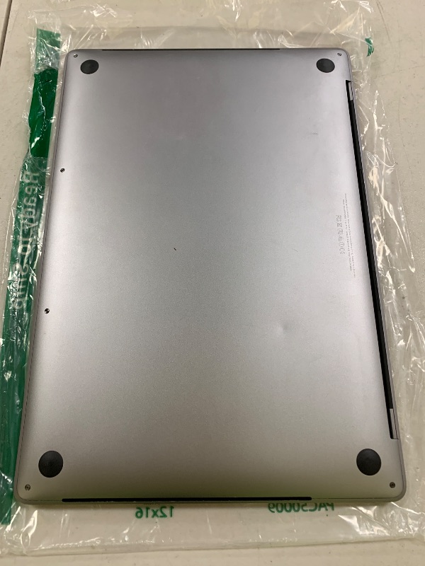 Photo 1 of FOR PARTS ONLY Apple MacBook Pro 15" Retina Core i7 2.6GHz MLH32LL/A with Touch Bar, 16GB Memory, 256GB Solid State Drive (Renewed)