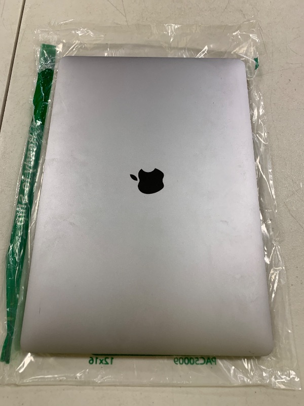 Photo 1 of FOR PARTS ONLY Apple MacBook Pro 15" Retina Core i7 2.6GHz MLH32LL/A with Touch Bar, 16GB Memory, 256GB Solid State Drive (Renewed)