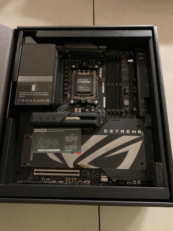 Photo 1 of ASUS ROG Crosshair X870E Extreme AMD X870E AM5 E-ATX Gaming Motherboard – 20+2+2 Power Stages, DDR5, PCIe 5.0, 5X M.2, 5G & 10G LAN, Wi-Fi 7, USB4 Type-C, 5” LCD, AI Overclocking & Networking
