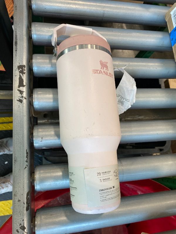 Photo 1 of **MAJOR DAMAGE**
STANLEY IceFlow 2.0 Flip Straw Tumbler with Handle 40 oz | Twist On Lid and Flip Up Straw | Leak Resistant Water Bottle | Insulated Stainless Steel | BPA-Free | Rose Quartz