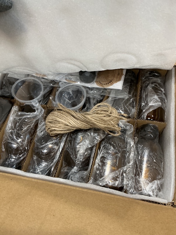 Photo 1 of *MISSING PARTS UNKNOWN*
54 Pack 4 oz Amber Boston Glass Bottle with Cap, Empty Glass Bottles for Homemade Vanilla Extract, Essential Oils, Juice, Potion, Syrup, Liquids, Christmas