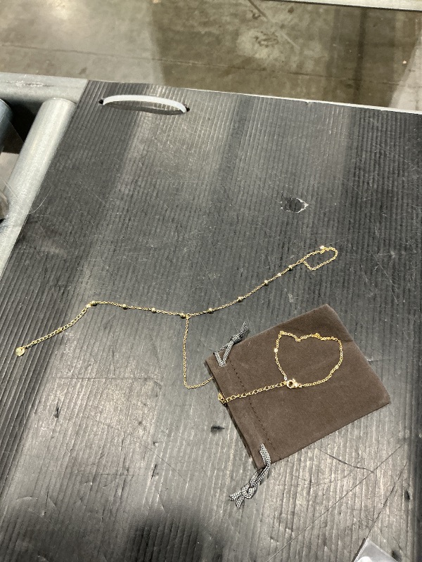 Photo 1 of  2 gold fantasy bracelets