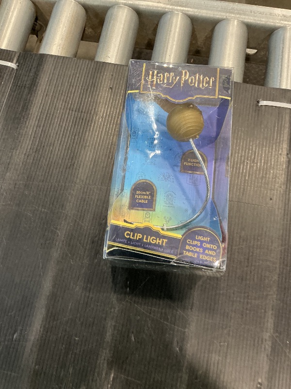 Photo 1 of **MINOR DAMAGE**
 Golden Snitch Harry Potter Themed Reading Light with Lumi Clip | Battery Powered