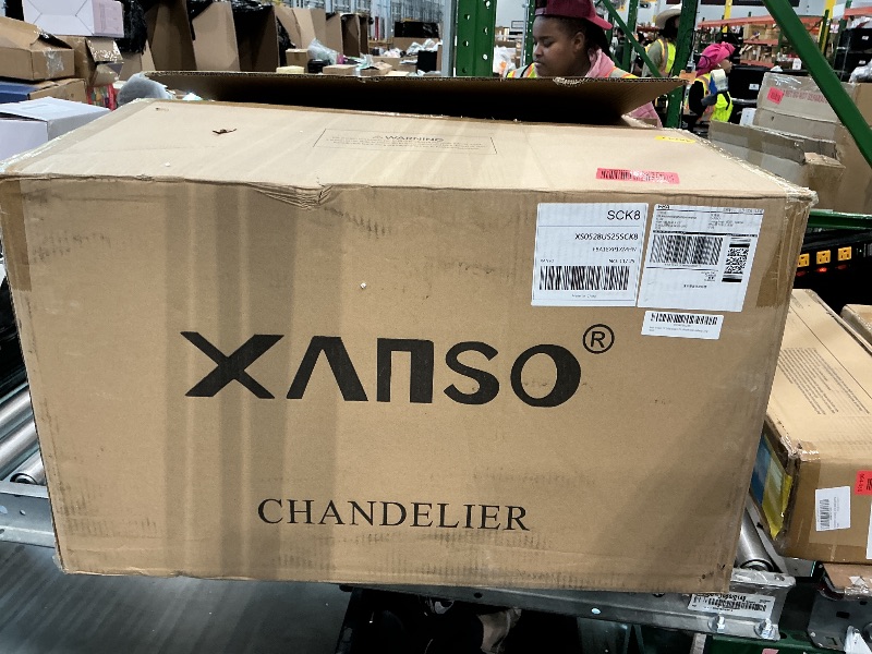 Photo 1 of **UNKNOWN MISSING PIECES**Winslow Chandelier 
1-Tier 
8-Light 
Clear Seeded Glass 
Size:20" W x 14.75" H x 44.5" L