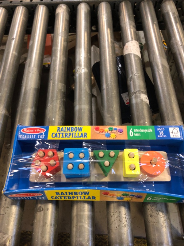Photo 1 of Melissa & Doug Rainbow Caterpillar Gear Toy with 6 Interchangeable Gears