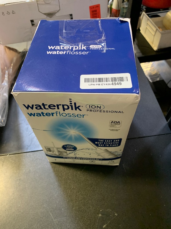 Photo 1 of Waterpik ION Professional Water Flosser, Rechargeable and Portable for Teeth, Gums, Braces, 10 Settings, 7 Flossing Tips For Multiple Users And Needs, ADA Accepted, WF-12 White, Packaging May Vary