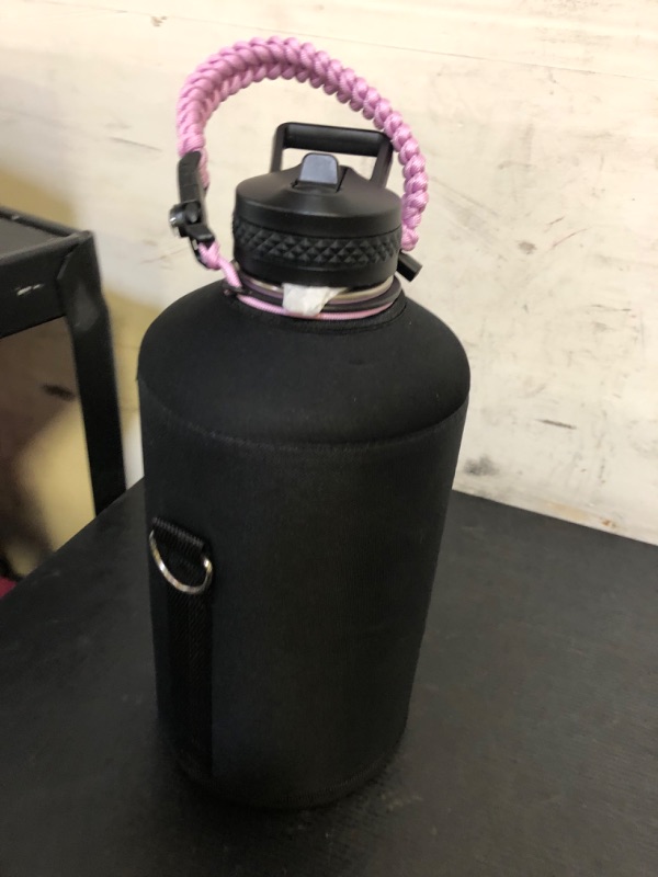 Photo 1 of RAYMYLO One Gallon Water Bottle Insulated, Triple Walled Vacuum Stainless Steel (Cold for 48 Hrs), Leak Proof & Non-BPA, Large Water Flask Jug with Paracord Handle & Straw Spout Lids