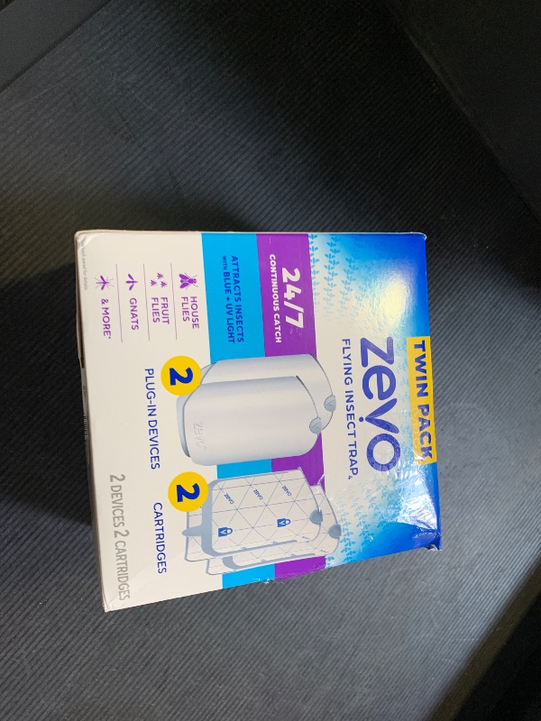Photo 1 of Zevo 2 Flying Insect Traps & 2 Refill Cartridges - Plug in Fly Trap & Indoor Bug Catcher for Gnats, House & Fruit Flies - Blue & UV Light Technology, Mess-Free Alternative to Bug Zapper