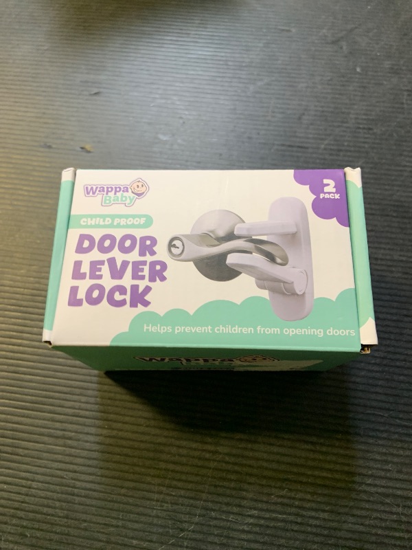 Photo 1 of Door Lever Lock (2 Pack) – Prevents Toddlers from Opening Doors – Easy One-Hand Operation for Adults – Durable ABS with 3M Adhesive Backing – No Tools Needed for Install