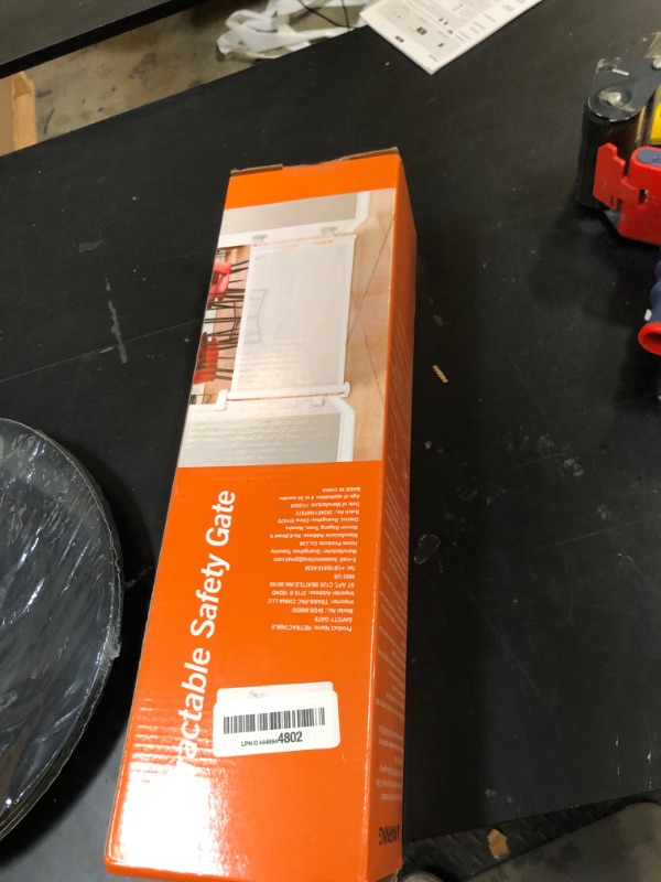 Photo 1 of 14" H Dog Gate - Puppy and Small Dog Gates, Retractable Mesh Step Over Pet Fence, Expands Up to 59" Indoor/Outdoor, Perfect for Doorways & Stairs