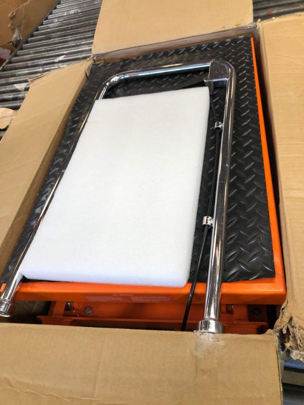 Photo 1 of VEVOR Hydraulic Lift Table Cart, 330lbs Load Capacity 50 Inch Lifting Height, Manual Single Scissor Lift Table with Non-Slip Pad and 4 Wheels, Hydraulic Scissor Cart for Material Handling, Orange