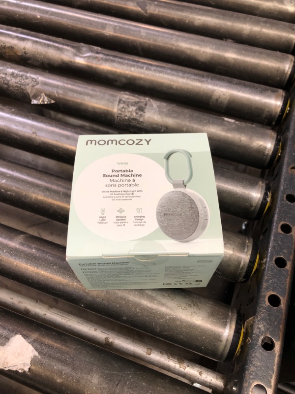 Photo 1 of Momcozy Portable Sound Machine with Night Light, White Noise Sound Machine for Baby, 20 Soothing Sounds, Sound Therapy, Long-Lasting Power, Timer, Clips on Stroller, Baby Shower Gifts