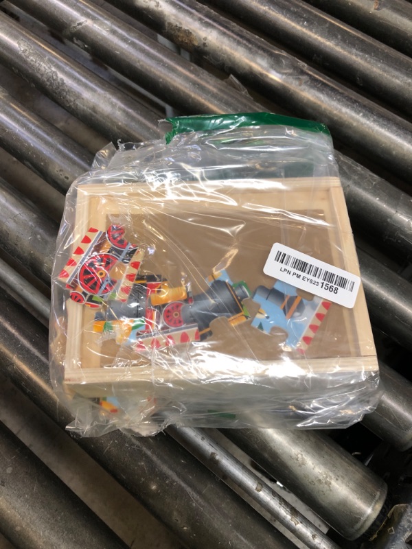 Photo 1 of Melissa & Doug 4?in?1 Wooden Vehicle Jigsaw Puzzle Set, 48 Pieces with Storage Box, Toddler Puzzle Toy for Kids Ages 3+- FSC Certified
