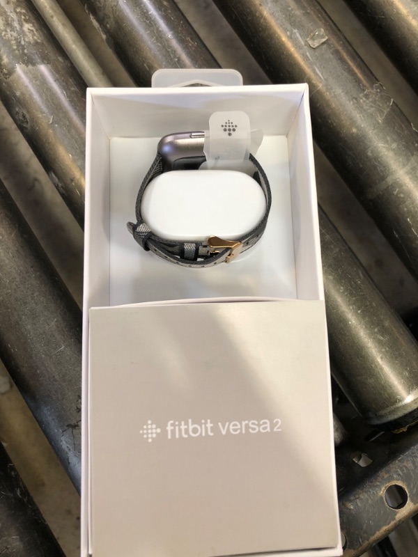 Photo 1 of Fitbit Versa 2 Special Edition Health and Fitness Smartwatch with Heart Rate, Music, Alexa Built-In, Sleep and Swim Tracking, Smoke Woven/Mist Grey, One Size (S and L Bands Included)