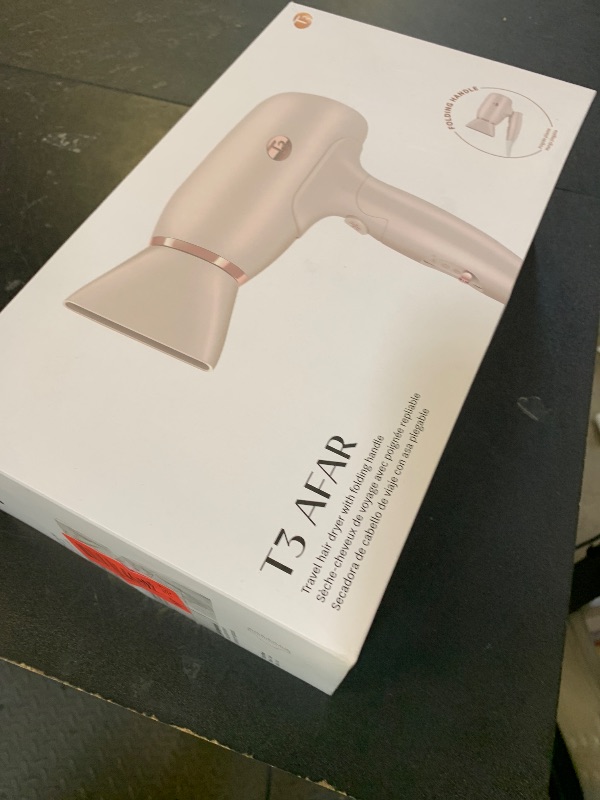 Photo 1 of T3 Afar Lightweight Travel-Size Hair Dryer with Auto Dual Voltage, Folding Handle, Fast Drying, Lightweight and Ergonomic, Frizz Smoothing, Multiple Heat and Speed Combinations
