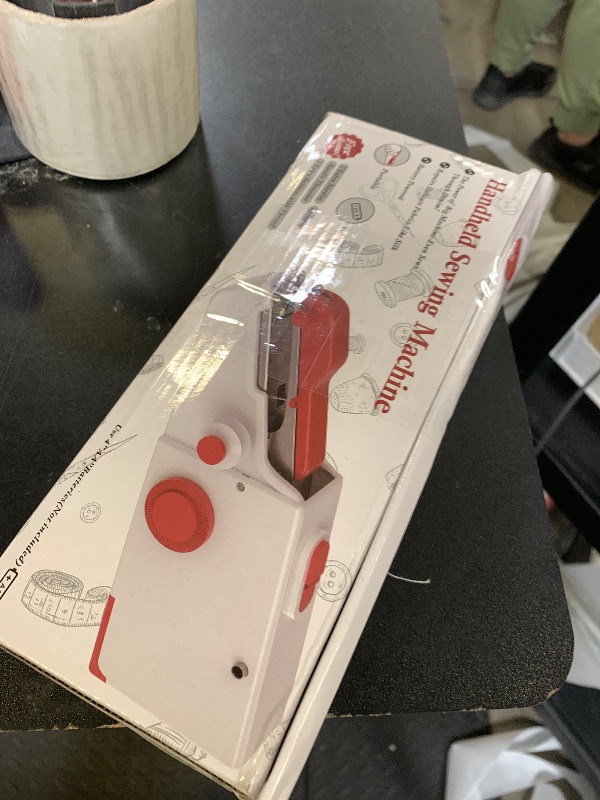 Photo 1 of Handheld Sewing Machine, Quick Sew Mini Portable Electric Sewing Machine For Beginners Adults, Easy To Use Suitable for Sewing Clothes, Fabrics, Cutains, Family Travel, DIY