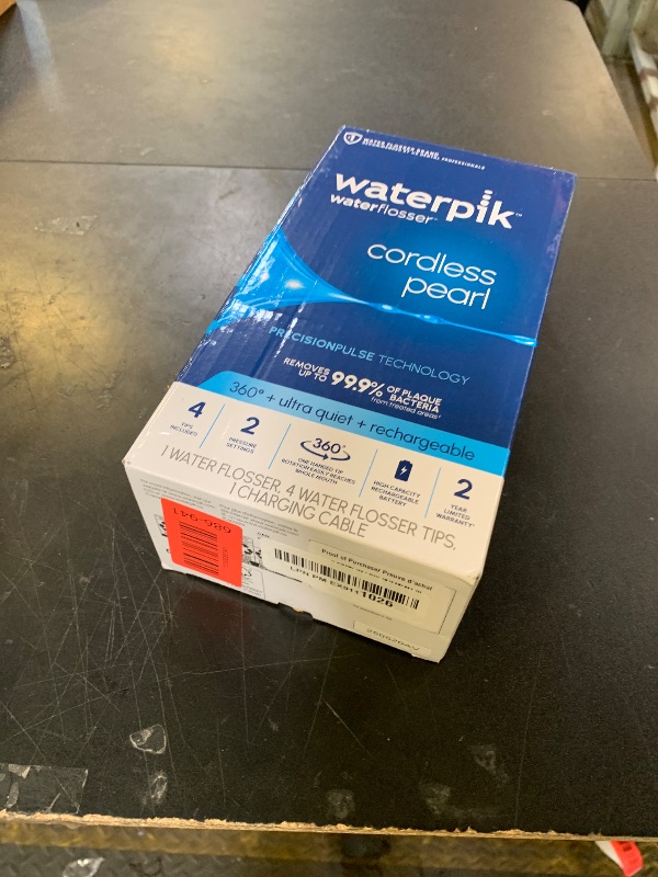 Photo 1 of Waterpik Cordless Pearl Rechargeable Portable Water Flosser for Teeth, Gums, Braces Care and Travel with 4 Flossing Tips - ADA Accepted, WF-13 White, Packaging May Vary
