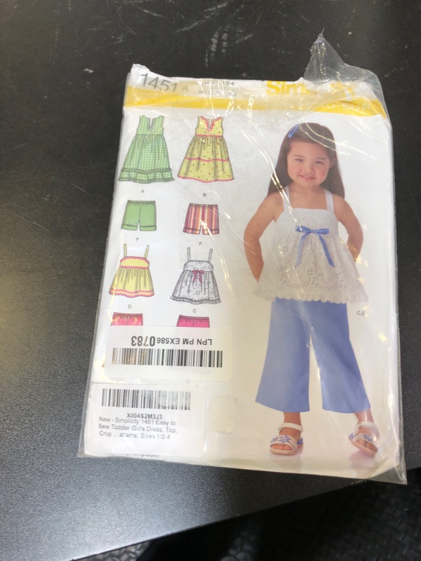 Photo 1 of Simplicity 1451 Easy to Sew Toddler Girl's Dress, Top, Cropped Pants, and Shorts Sewing Patterns, Sizes 1/2-4
