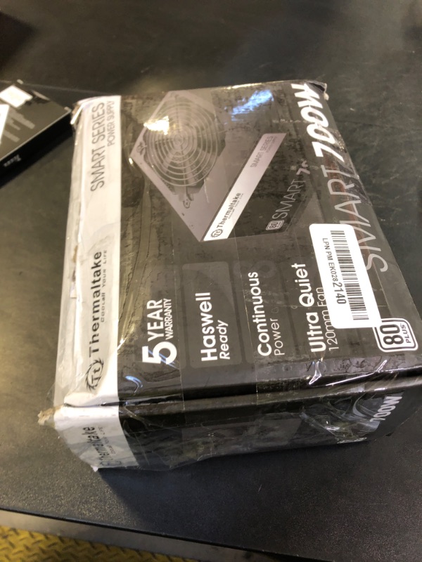 Photo 1 of Thermaltake Smart 700W 80+ White Certified PSU, Continuous Power with 120mm Ultra Quiet Fan, ATX 12V V2.3/EPS 12V Active PFC Power Supply PS-SPD-0700NPCWUS-W
