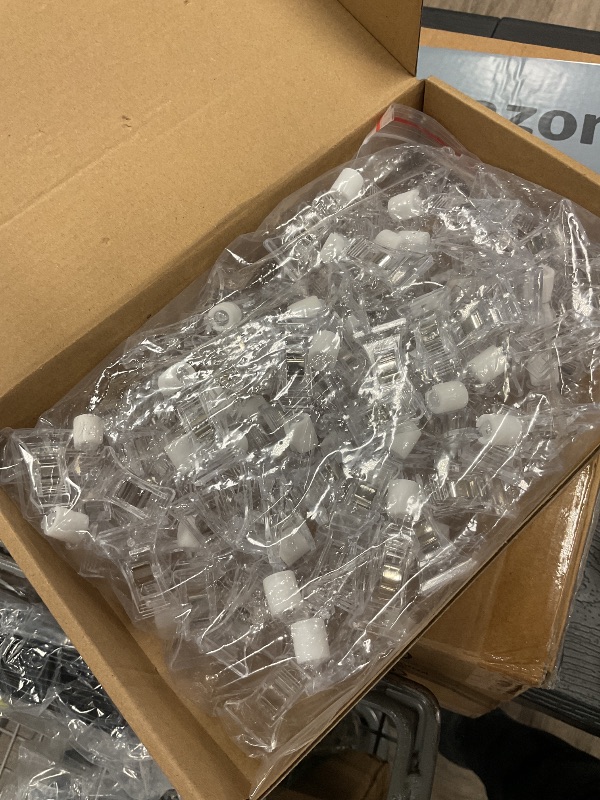 Photo 1 of Colarr 50 Pcs Double Sided Sign Clips - Rotatable Mini Clip Clear Plastic Sign Holder Stand for Label Clothing Business Cards Retail