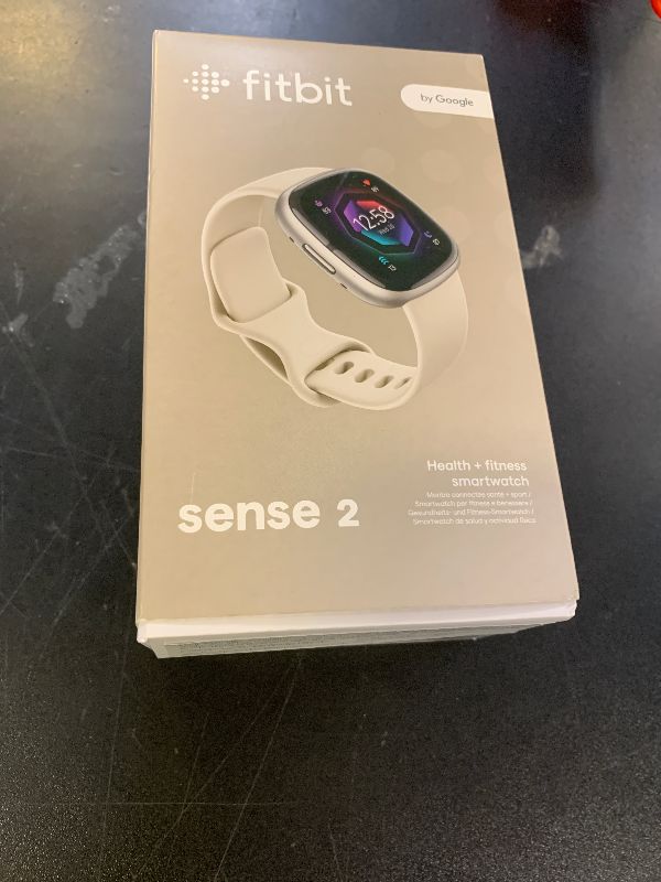 Photo 1 of Fitbit Sense 2 Advanced Health and Fitness Smartwatch with Tools to Manage Stress and Sleep, ECG App, SpO2, 24/7 Heart Rate and GPS, Lunar White/Platinum, One Size (S & L Bands Included)